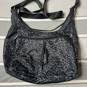 Baggalini cross body carry all, EUC